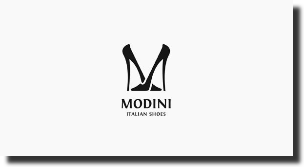 negative space logo in MODINI